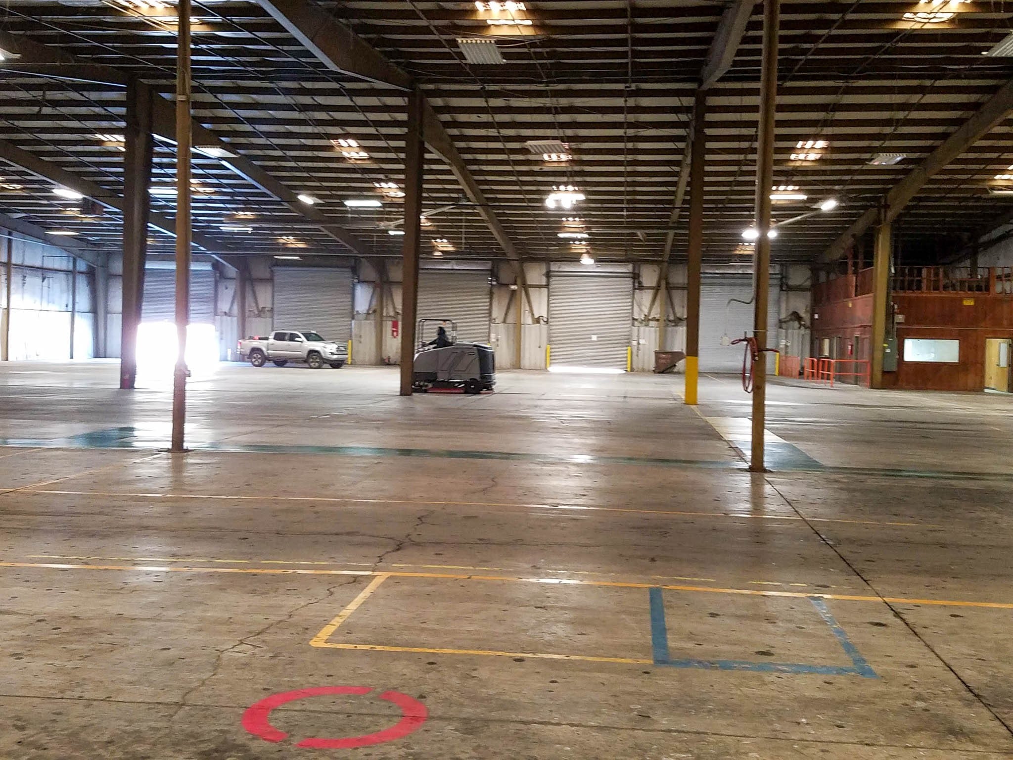 Photo of Penson Pressure Washing team member performing parking garage maintenance services in the Metro Atlanta area