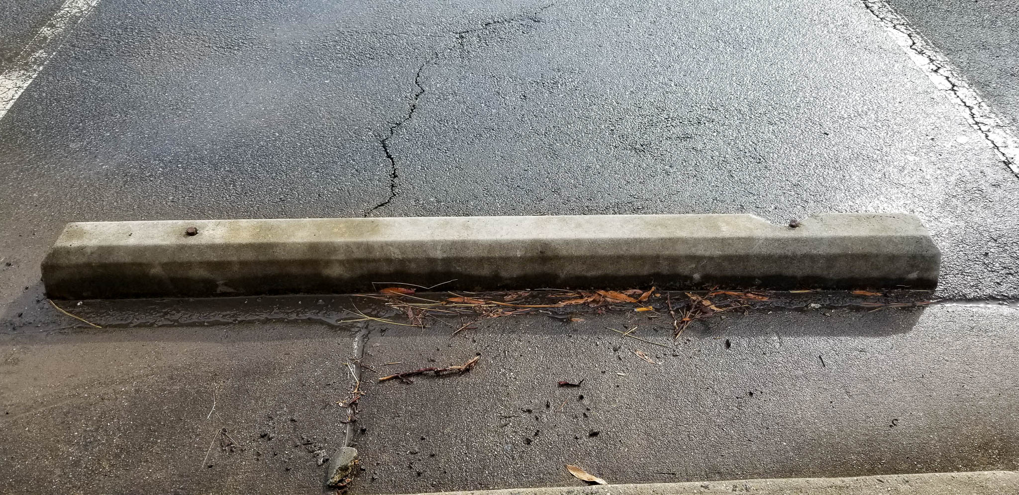 Before pressure washing parking lot