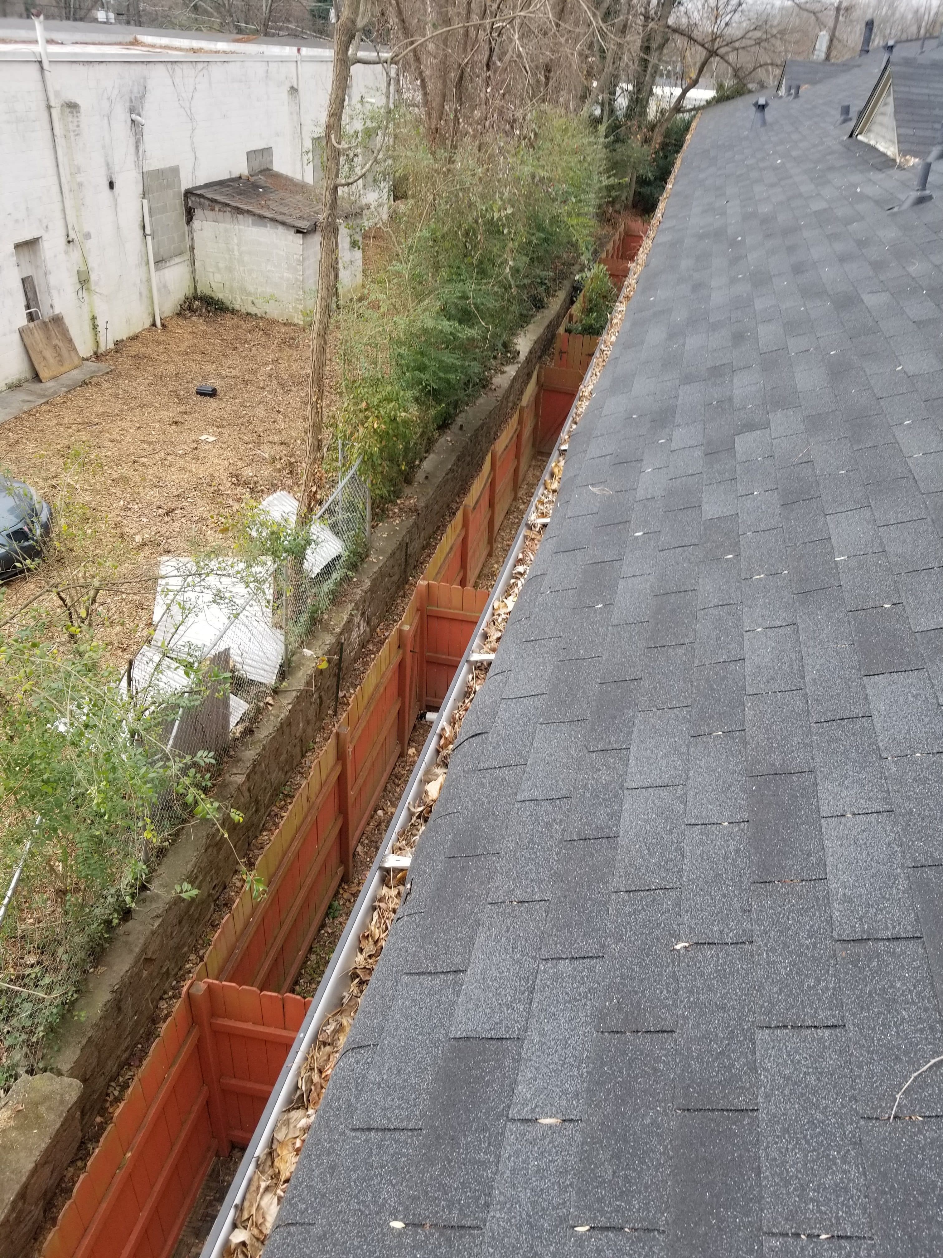 Photo of a Penson Pressure Washing client rooftop before fall gutter cleaning